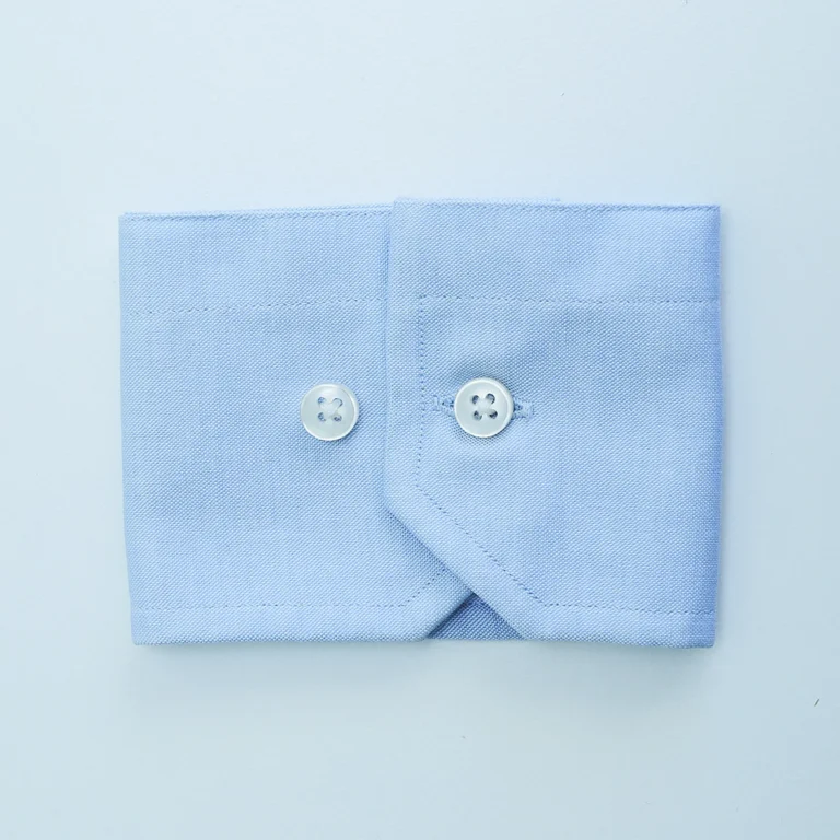 polsino smussato 2 bottoni