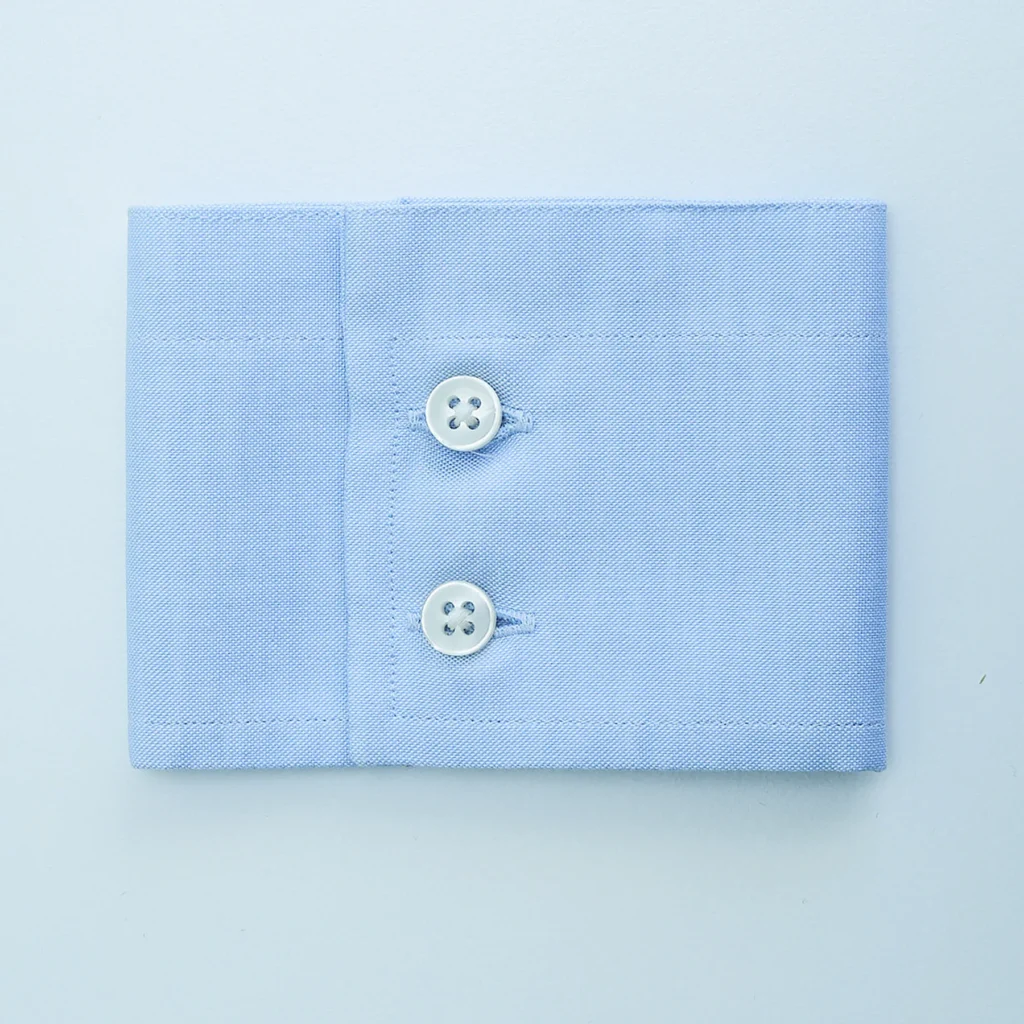 polsino retto due bottoni