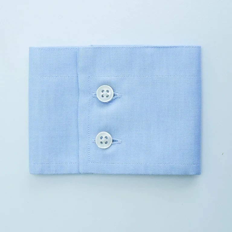 polsino retto due bottoni